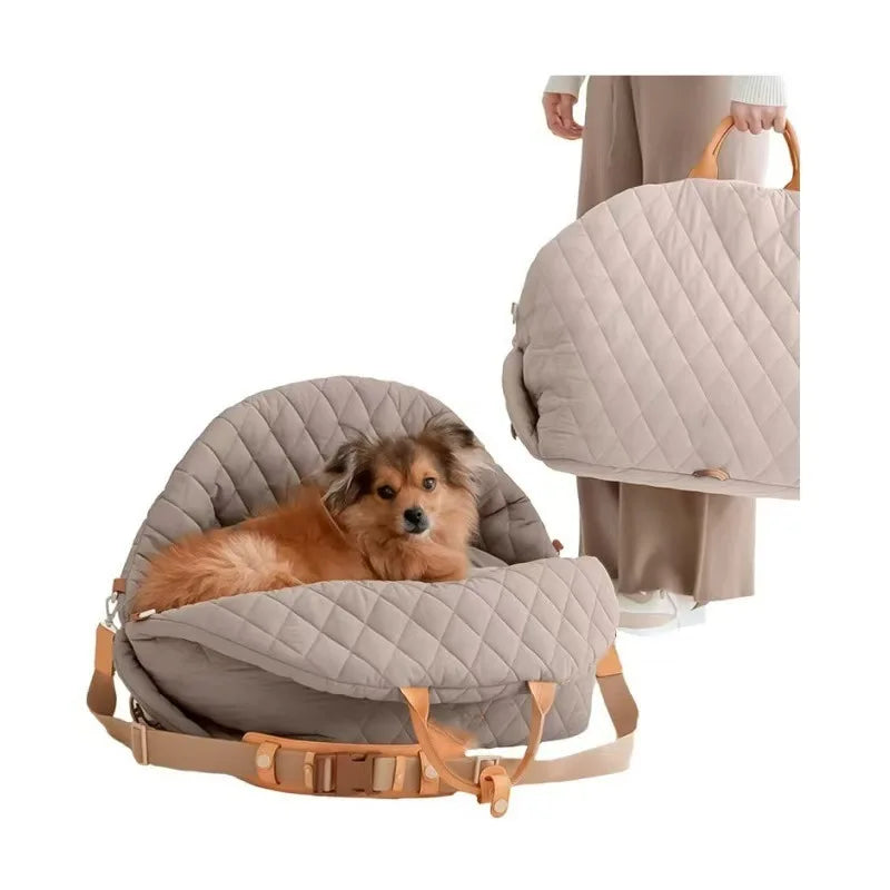 Gray quilted dog car seat carrier bed with safety straps and tan buckles