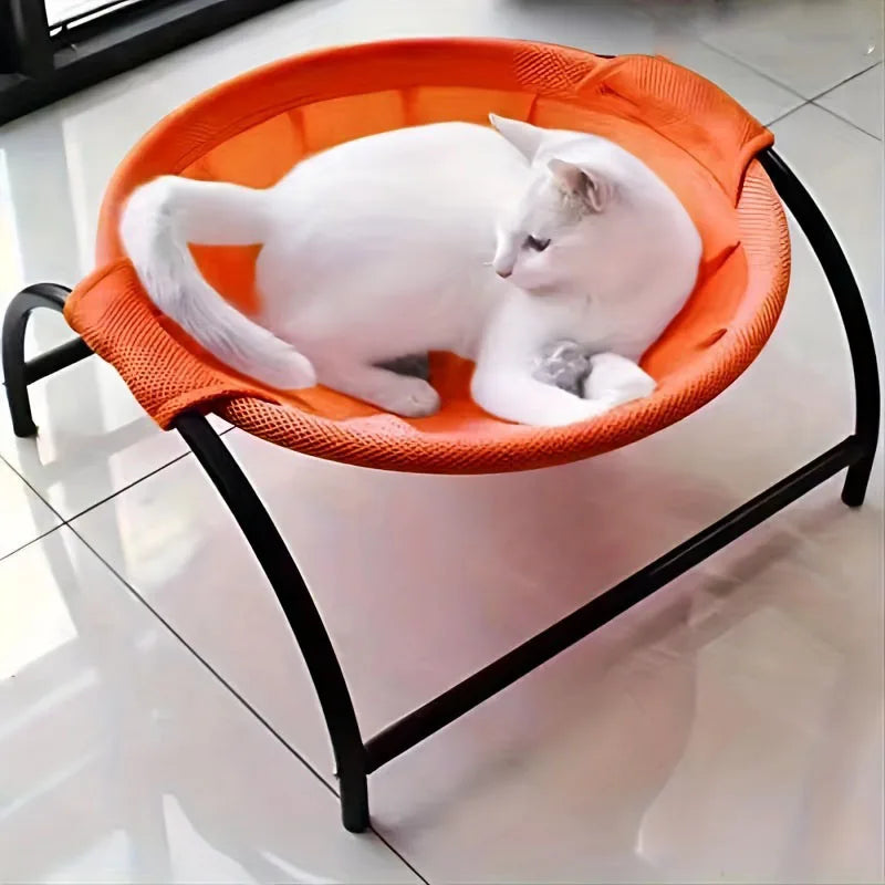 Cat hammock bed with orange mesh hammock and black metal stand, cat resting inside