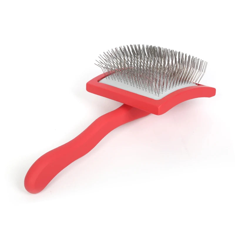 Pet grooming hair remover brush with red handle and metal pins