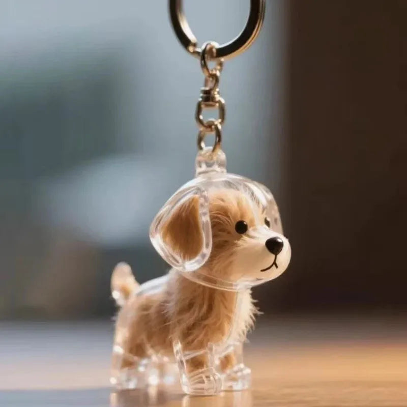 Dog-shaped resin capsule keychain with light brown fluffy fur and metal loop