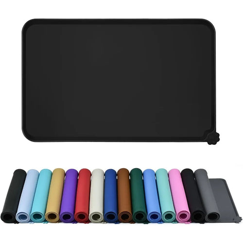 Black silicone pet feeding mat with high raised edge, flat rectangular design