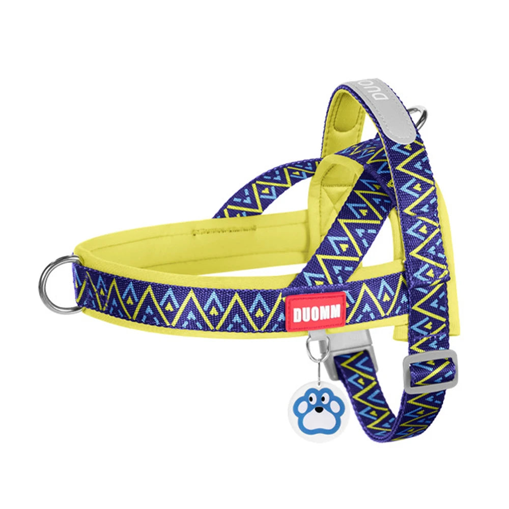 Padded no-pull dog harness vest with blue geometric print and neon yellow trim, leash clips