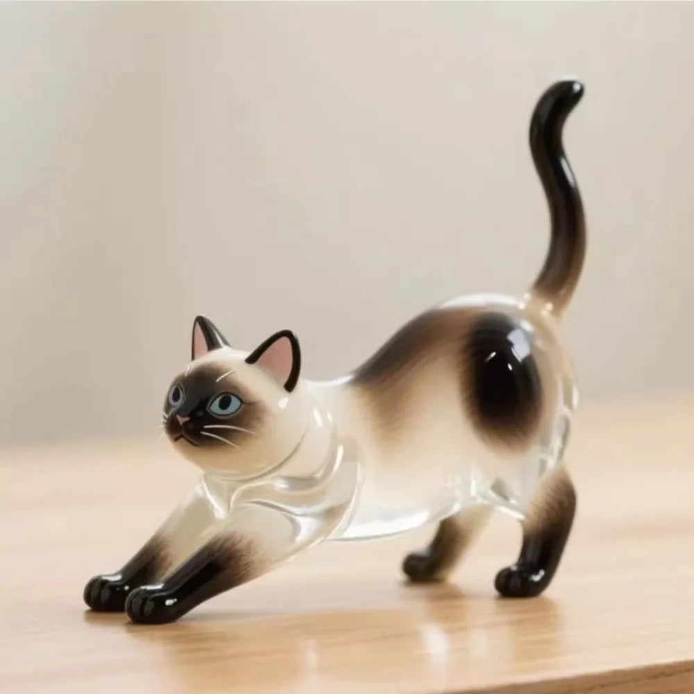Transparent pet hair memorial keychain capsule with Siamese-style cat figurine