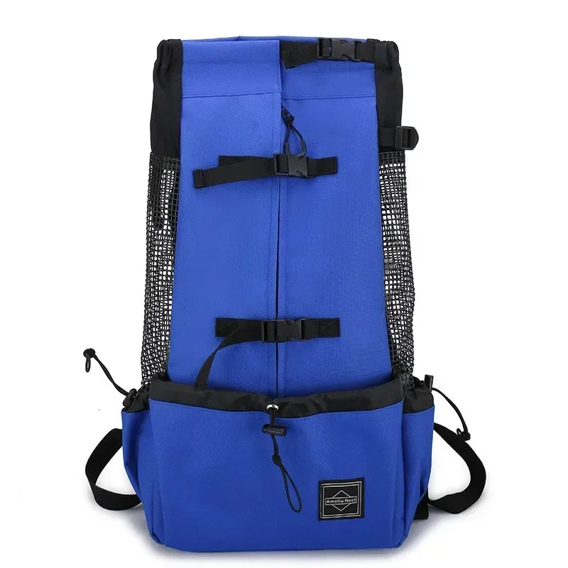 Blue dog travel carrier backpack with black mesh side panels and front straps