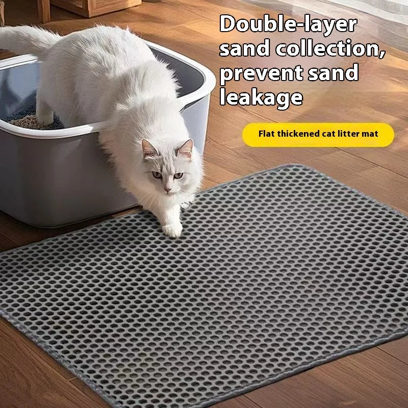 Gray honeycomb cat litter trapping mat with raised grid texture for paw cleaning