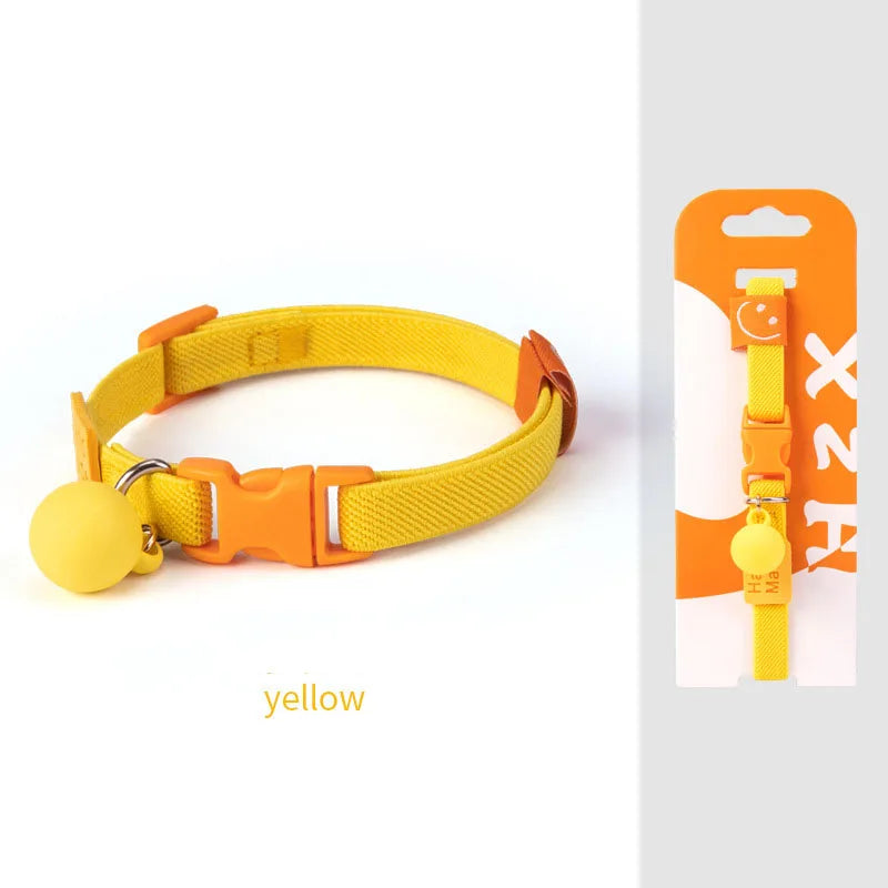 Yellow elastic adjustable cat & dog collar with orange buckle and bell charm