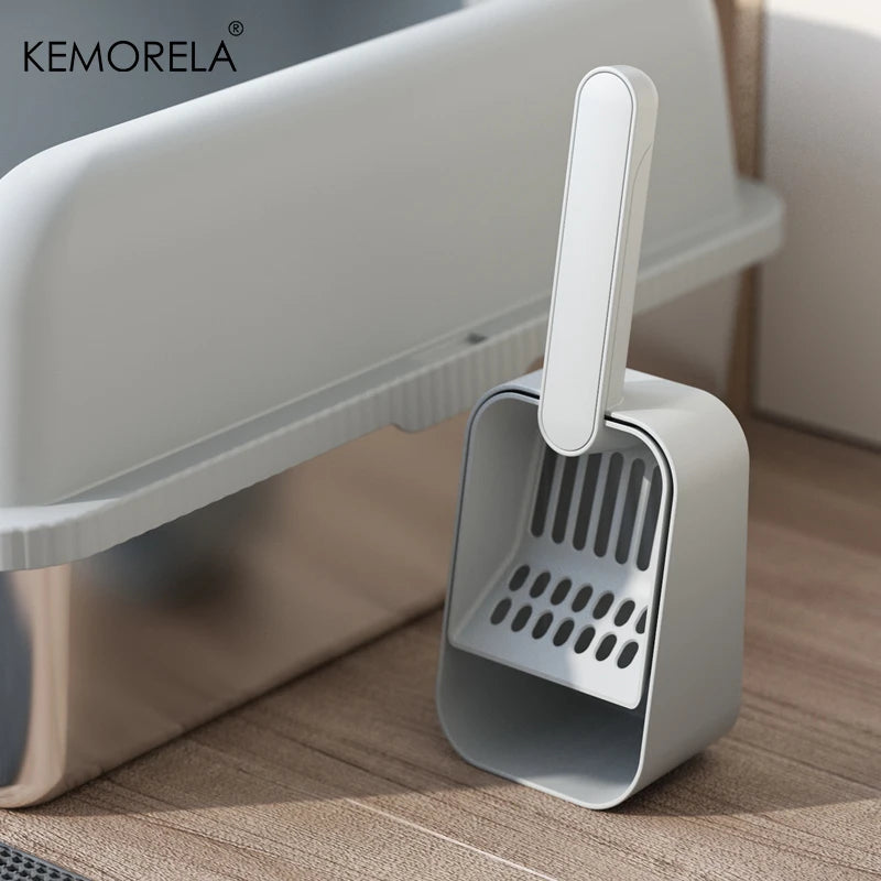 Light gray cat litter scoop with perforated shovel and base, upright handle