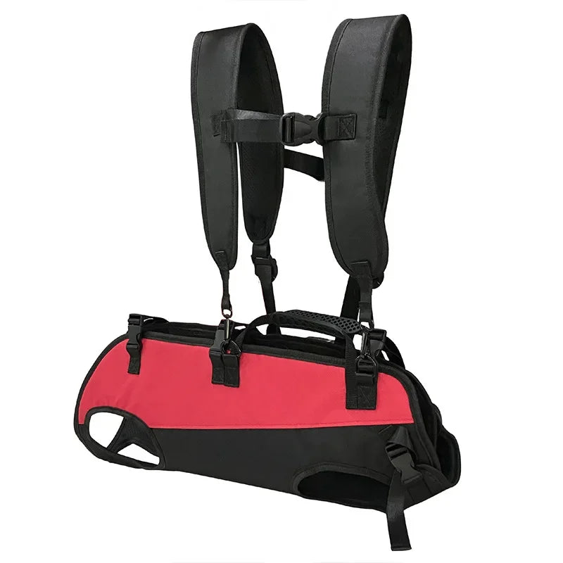 Red and black dog backpack carrier with padded shoulder straps and front carrying handle