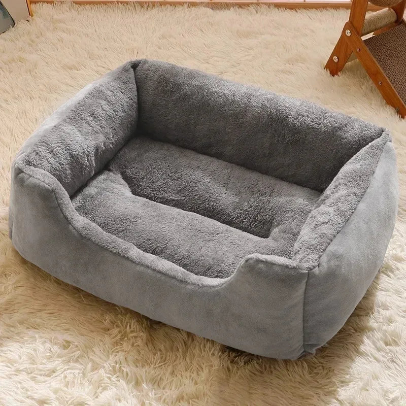 Square pet bed, gray exterior with deep gray plush interior and cushioned base