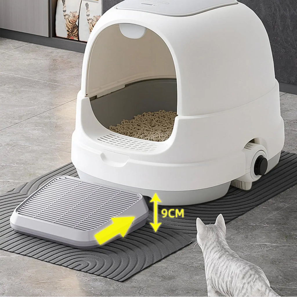 Cat litter ramp mat with white raised tray platform and textured anti-slip base