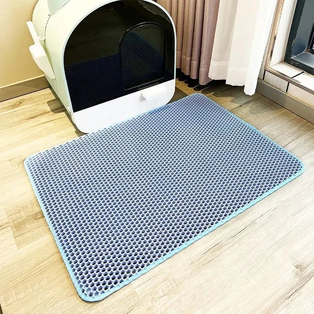 Urine-proof foldable litter mat with honeycomb texture, light blue-gray surface
