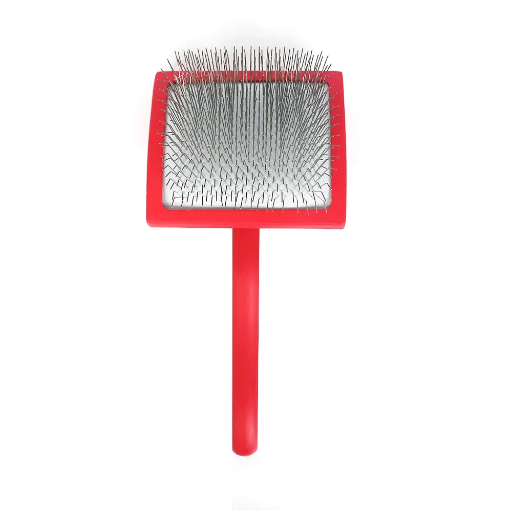 Red double-sided pet grooming brush with a square silver-pin head