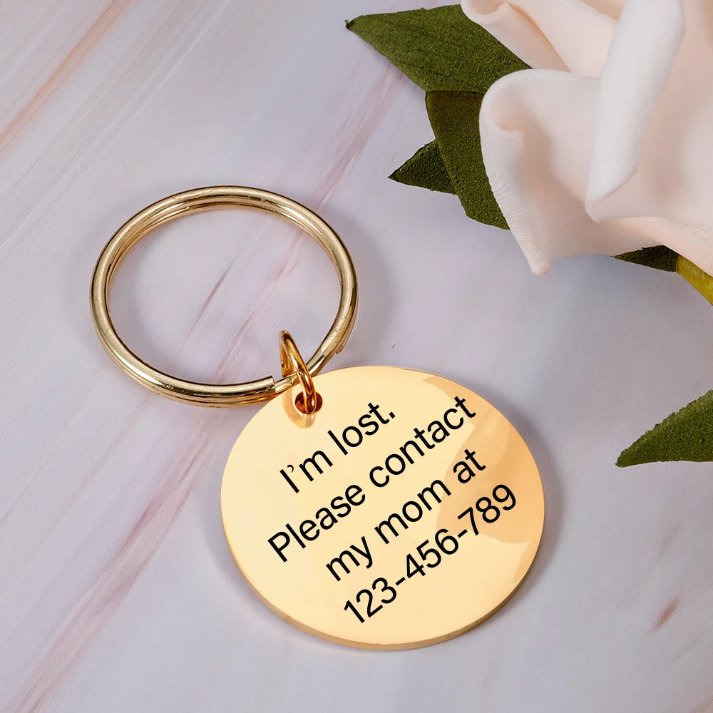 Rose gold round pet ID tag with lost contact text on a gold-tone keyring