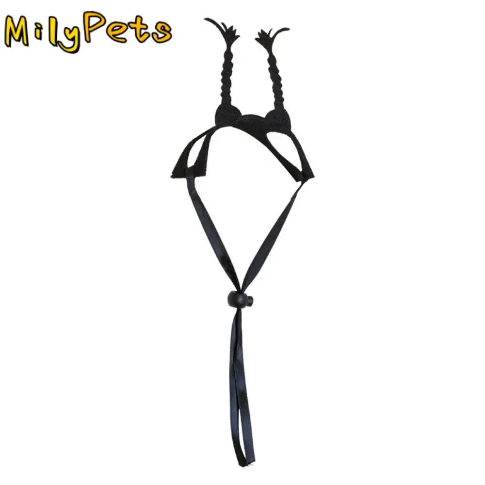 Black pet headband with tall horn-style ears and long dangling ribbon ties