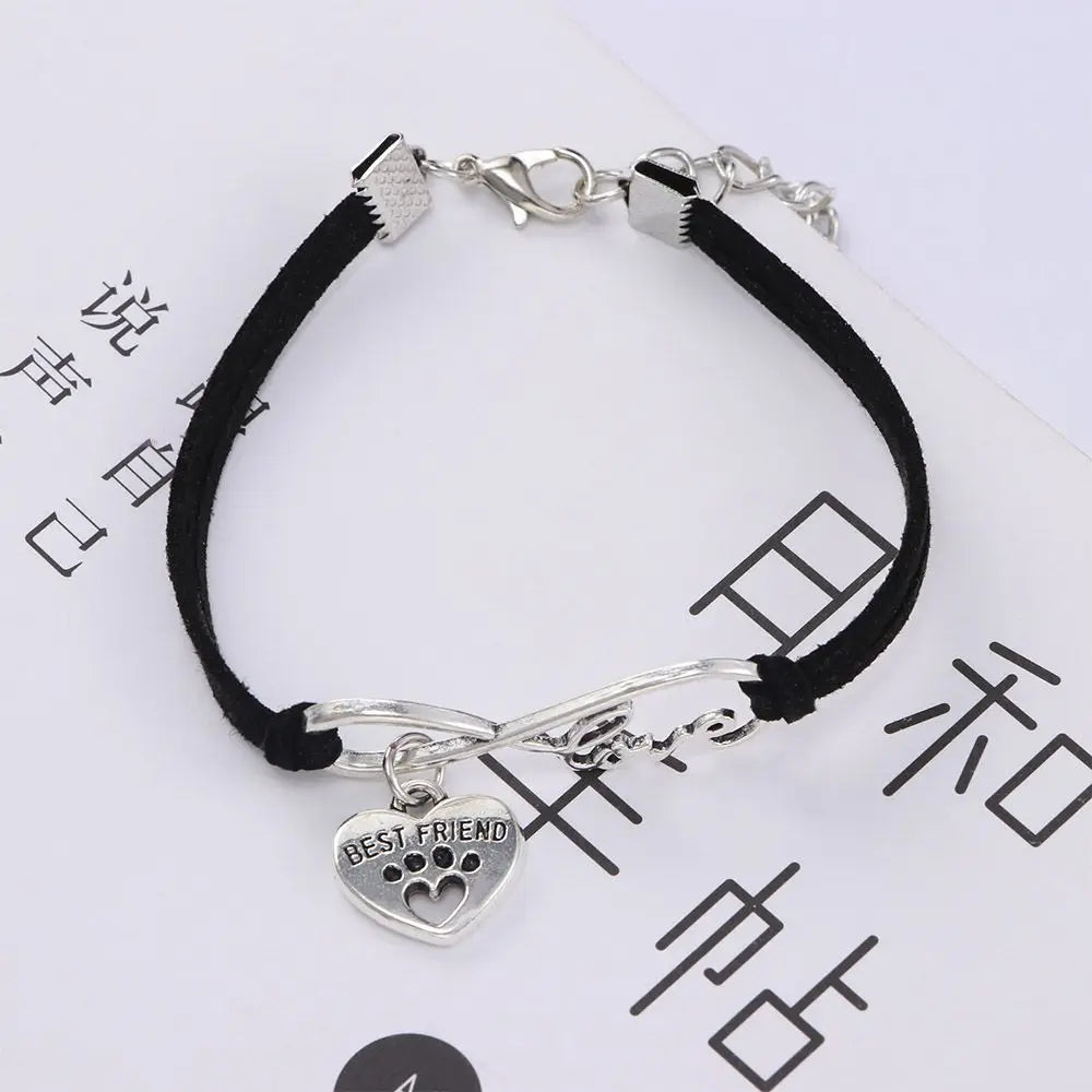 Adjustable dark pet collar with heart “Best Friend” charm and silver “love” bar, chain clasp