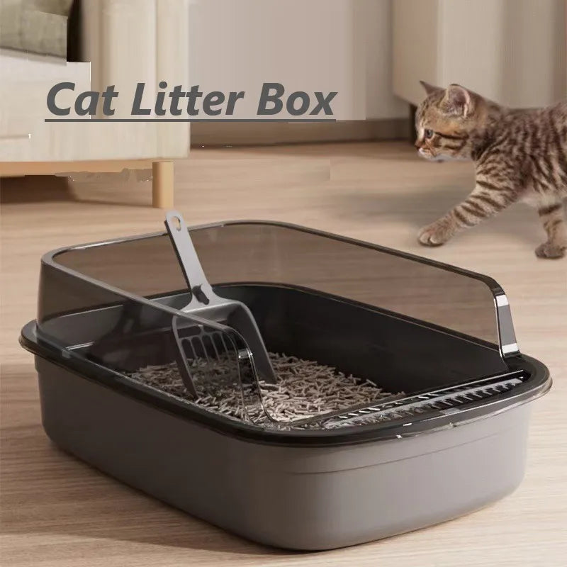 Grey semi-enclosed cat litter box with hood and scoop, open front top