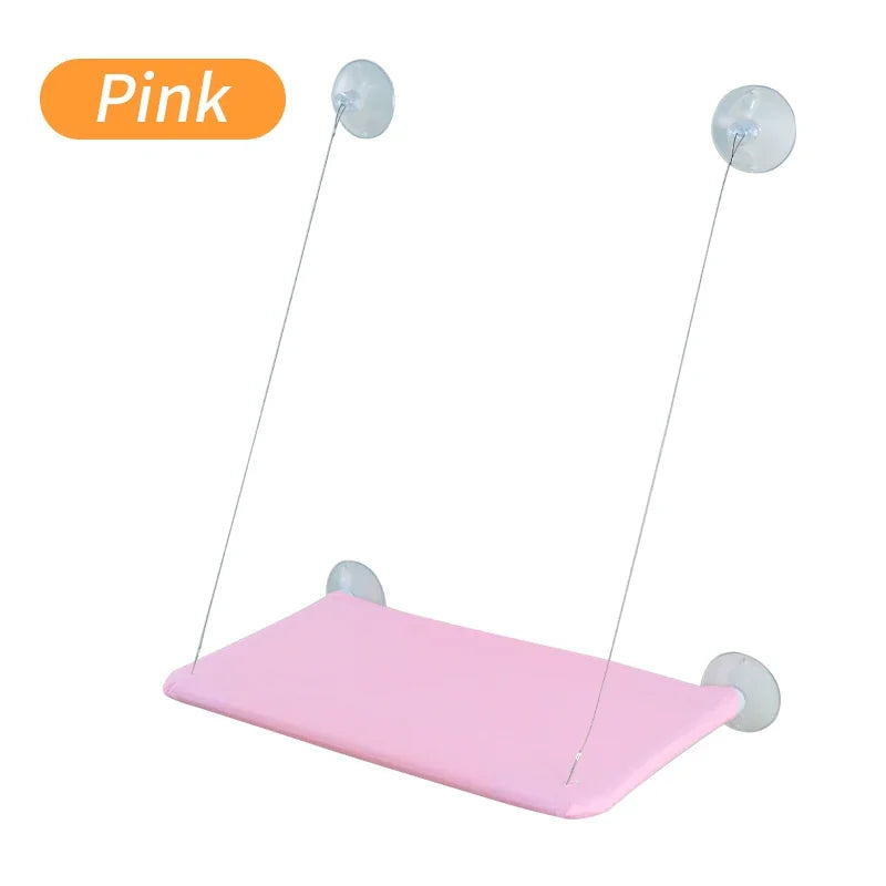 Hanging cat hammock bed with pink cushion and four hanging cords