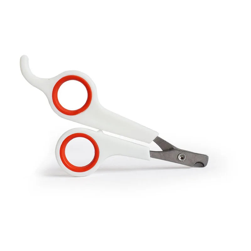 Pet nail trimmer scissors with orange rings, white handles and metal cutting blades