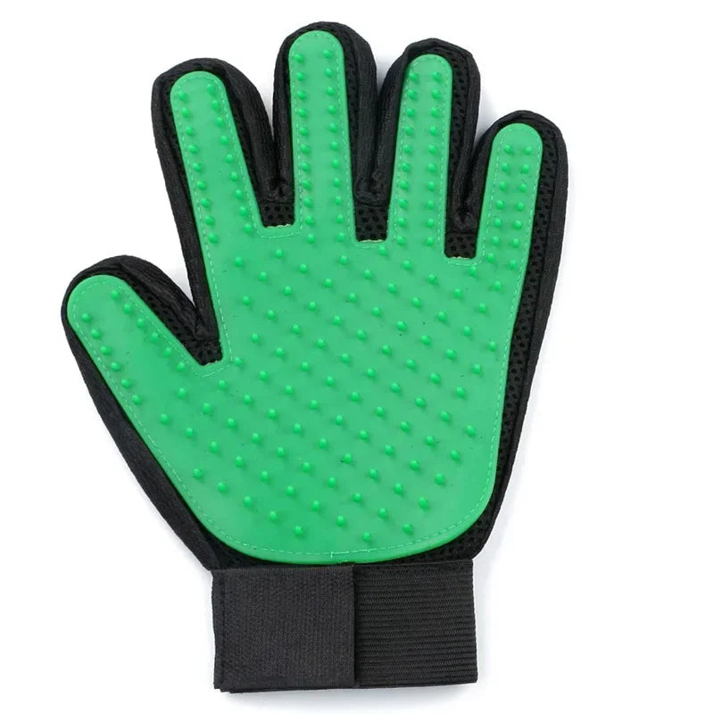 Green silicone pet grooming glove with raised nubs and black fabric wrist strap
