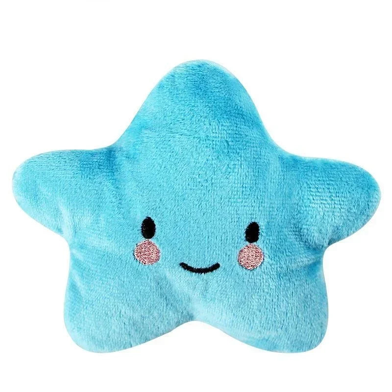 Squeaky plush pentagram pet toy in light blue star shape with smiling face and rosy dots.