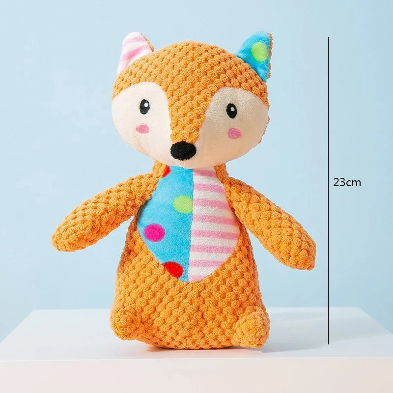 Orange fox-shaped squeaky plush toy with striped shirt and multicolor patches, 23cm