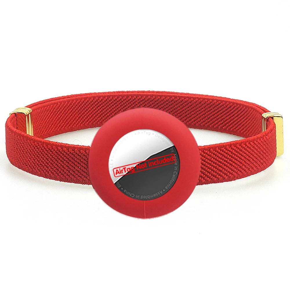 Red cat collar with AirTag holder, safety breakaway clasp and gold hardware.