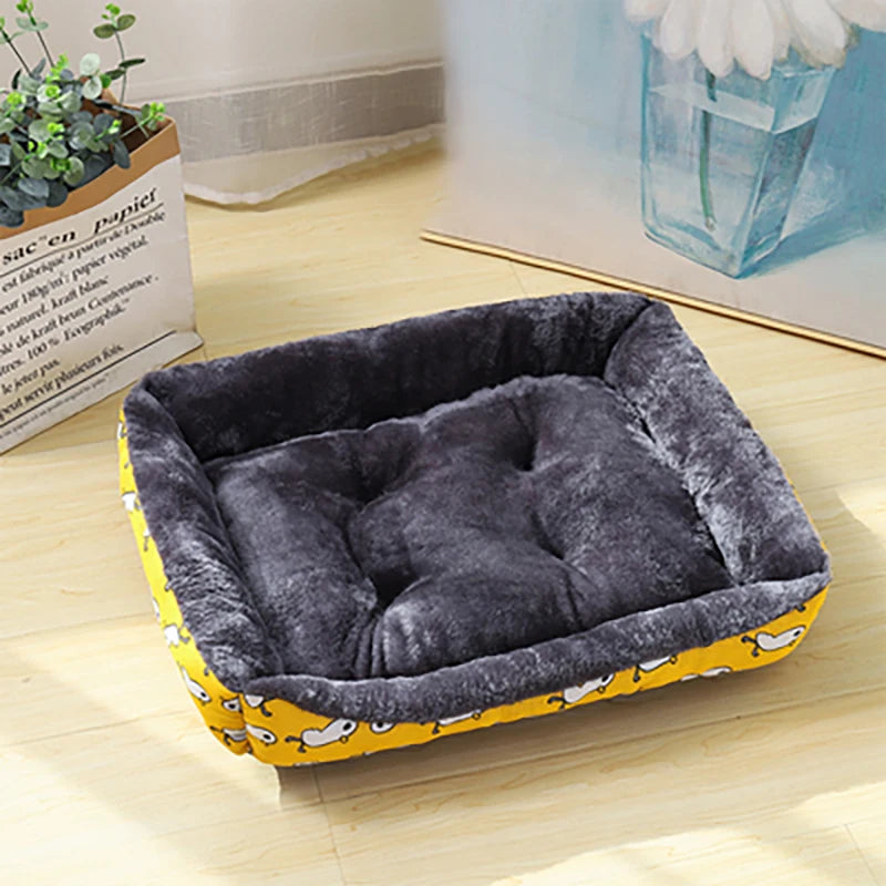 Dark gray plush dog sofa bed mat with yellow patterned outer cushion