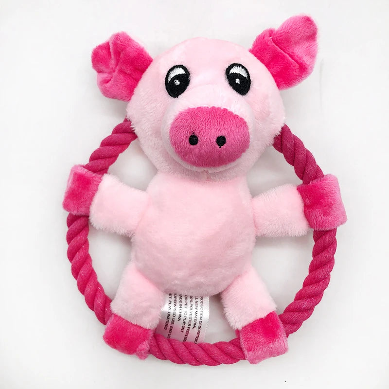 Pink plush pig rope chew toy with braided rope ring