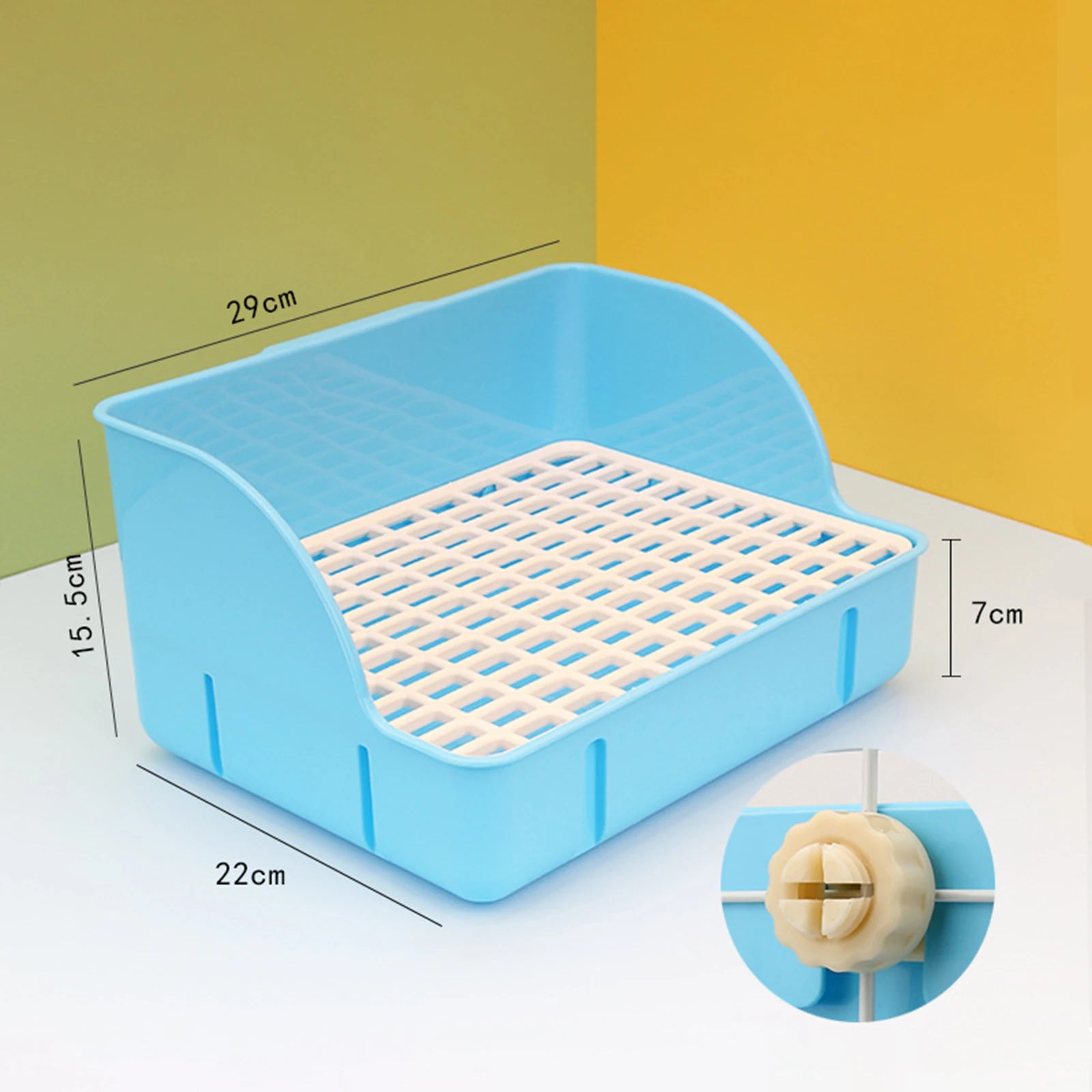 Small animal litter box with blue frame and white mesh tray, corner tabs shown
