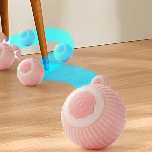 Pink rolling cat toy ball with blue ball by a wooden stand