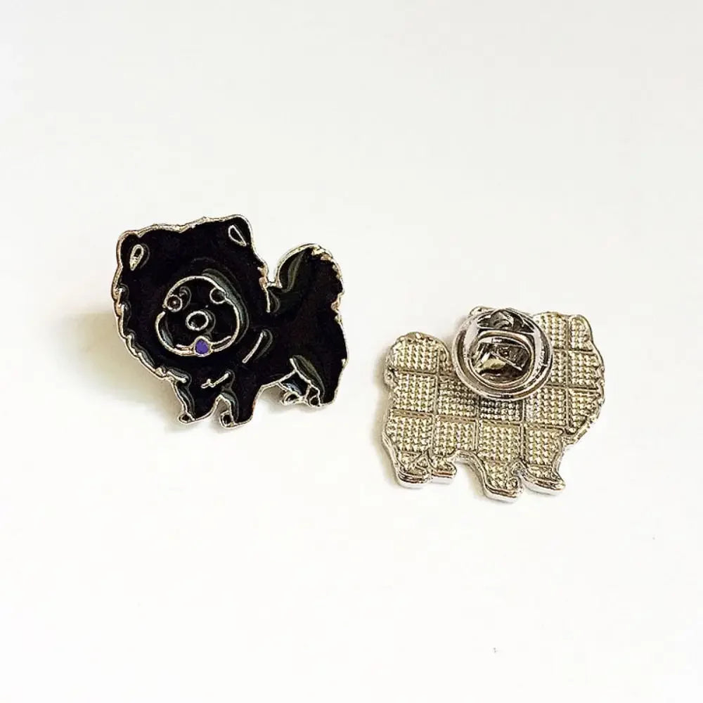 Black cartoon dog enamel pin with metal clasp backing