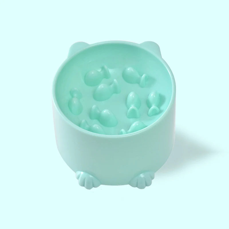 Mint slow feeder pet bowl with raised paw feet and textured puzzle insert