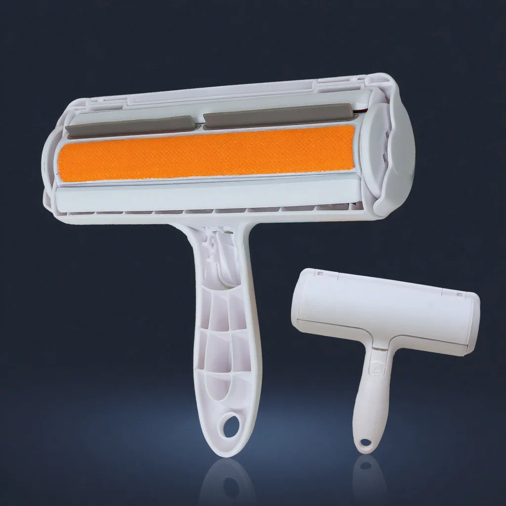 Handheld pet hair remover roller with orange roller head and self-cleaning base