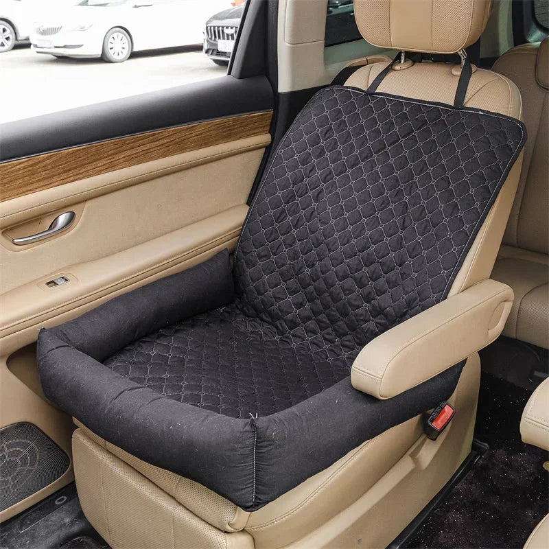 Pet car seat bed cover in dark gray quilt pattern with padded cushion and side bolsters.