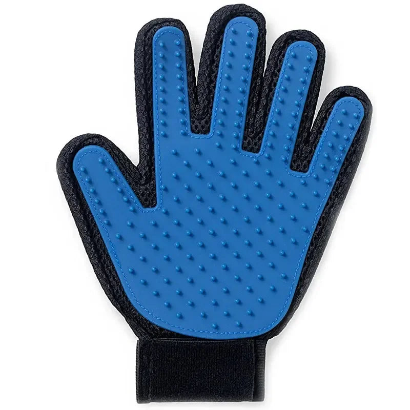 Blue silicone pet grooming glove with raised nodules, close-up view