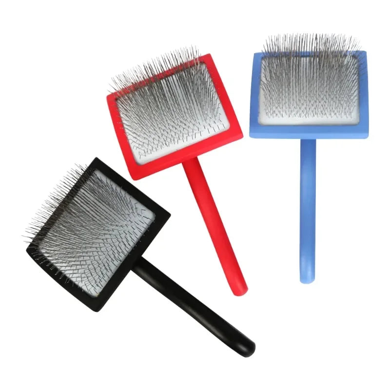 Double-sided pet grooming brushes with red, black, and blue handles and silver pins