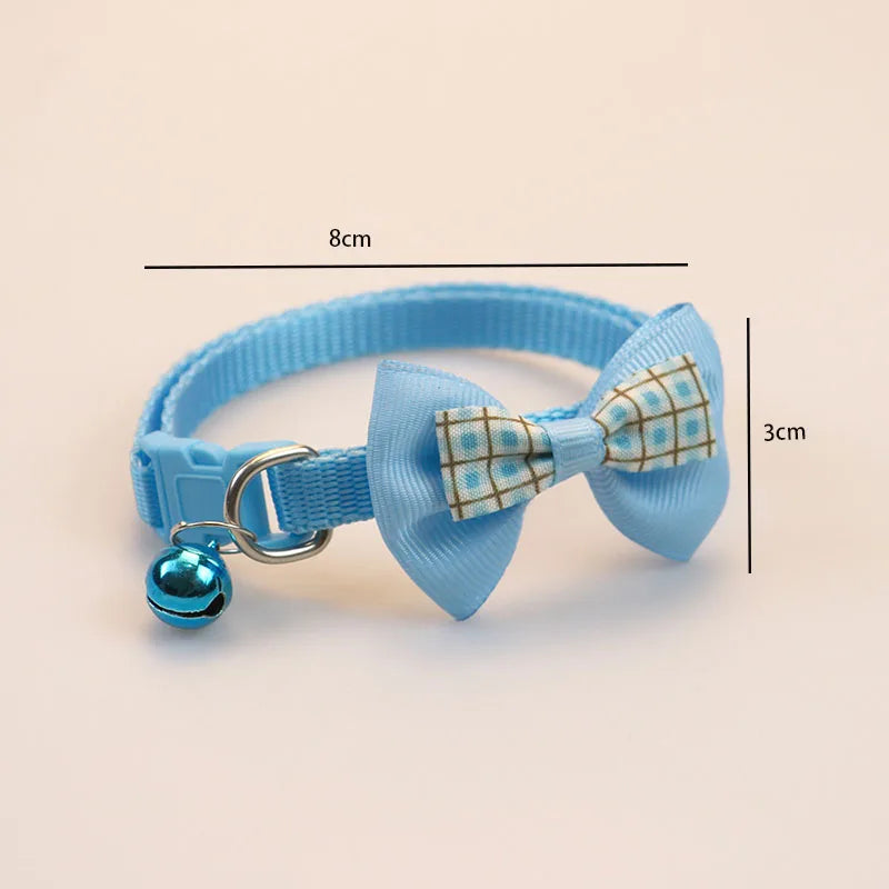 Light blue cat collar with bow tie and bell