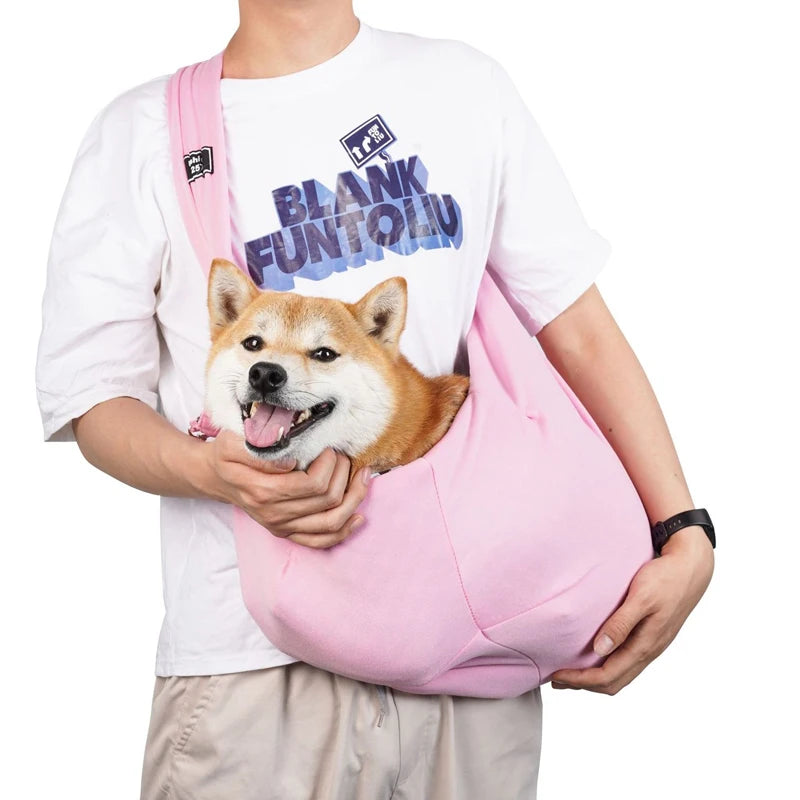 Light pink pet travel shoulder sling bag with adjustable shoulder strap