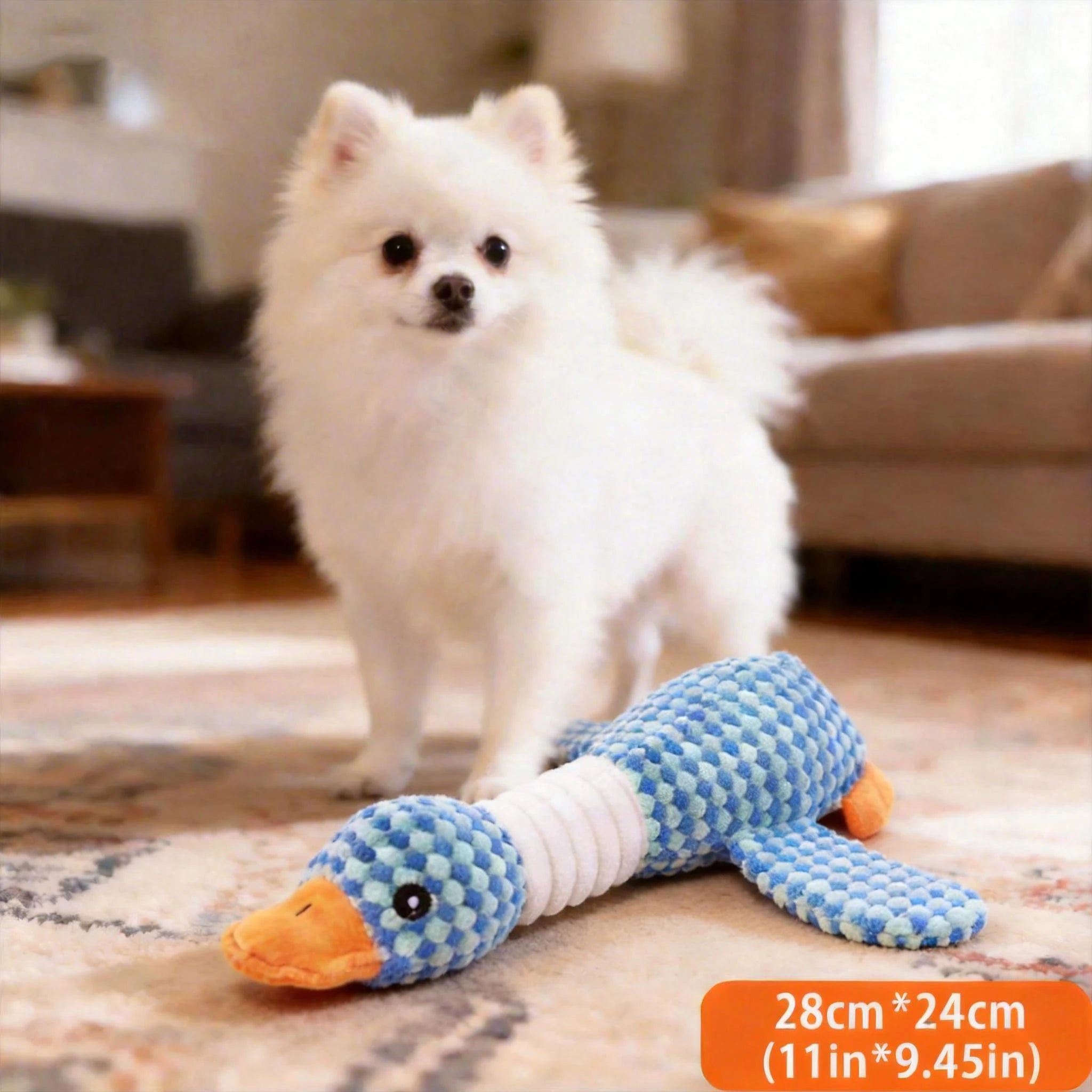 Plush goose squeaky chew toy, blue textured body with white squeaker section and orange beak.