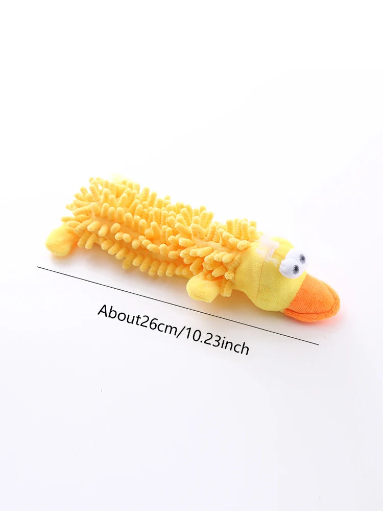 Yellow plush mop-shaped dog toy with small animal face and orange nose