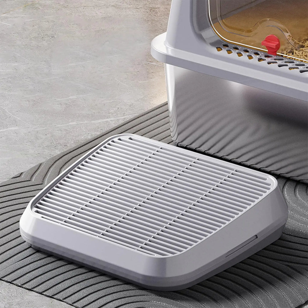Light gray cat litter ramp mat with raised slotted grid tray and anti-slip base