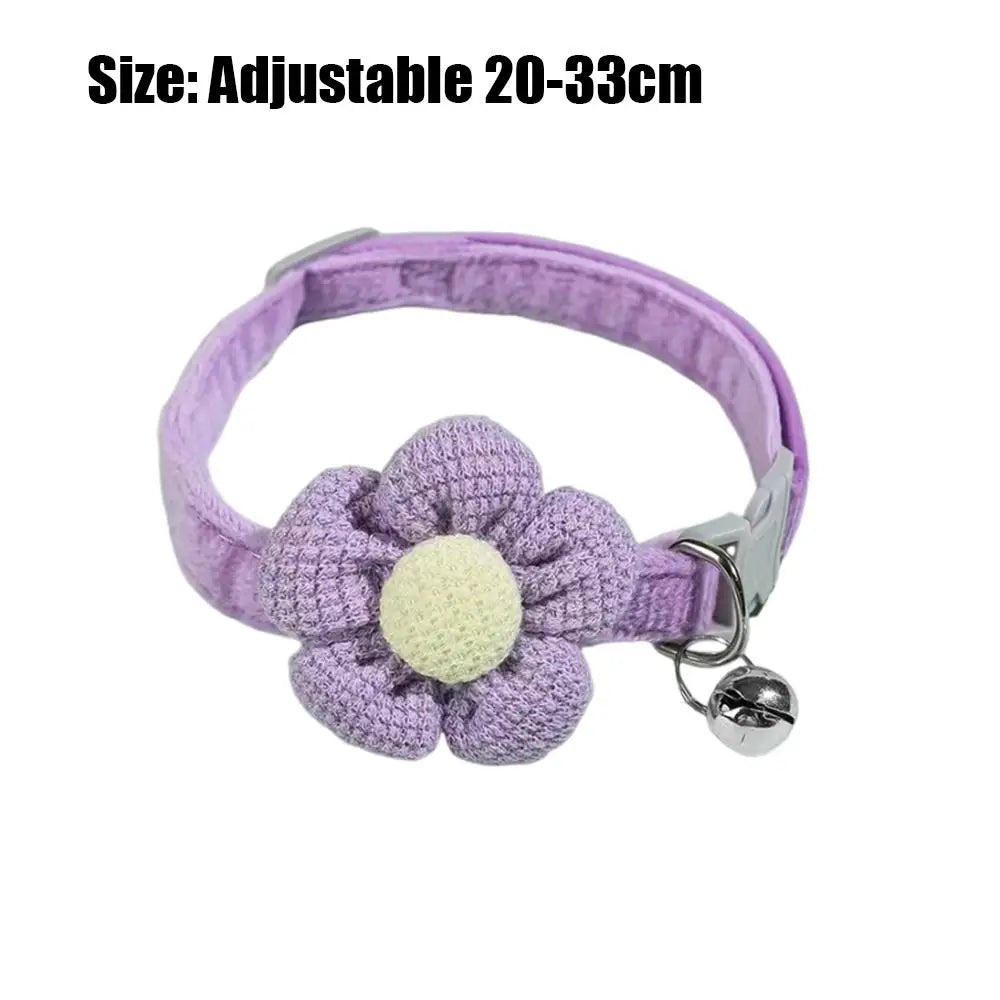 Lavender fabric flower cat collar with purple flower, adjustable buckle, and bell