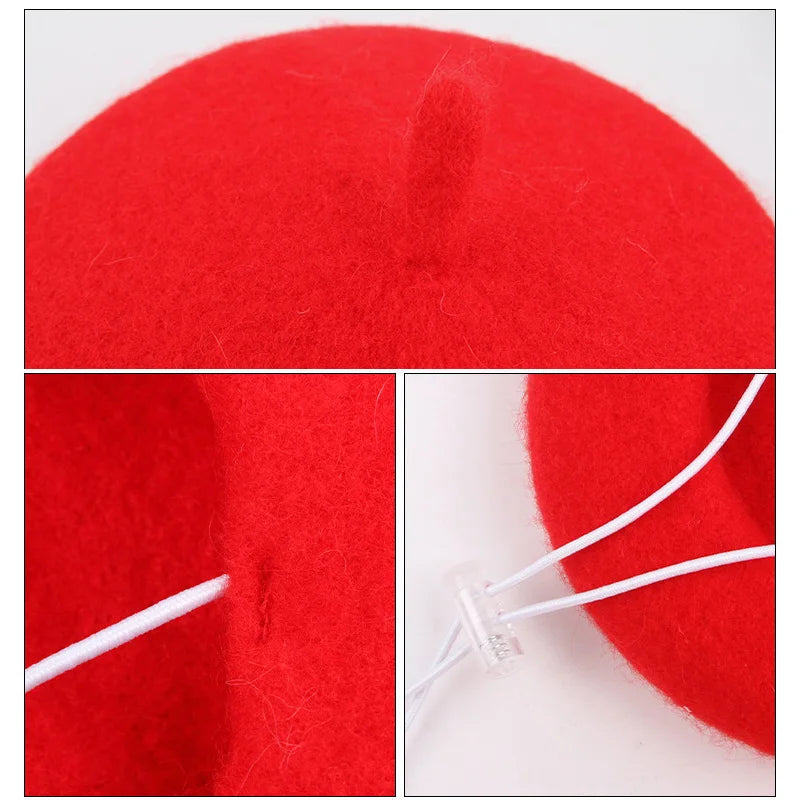 Red felt pet beret hat close-up with white tie cords and stitching