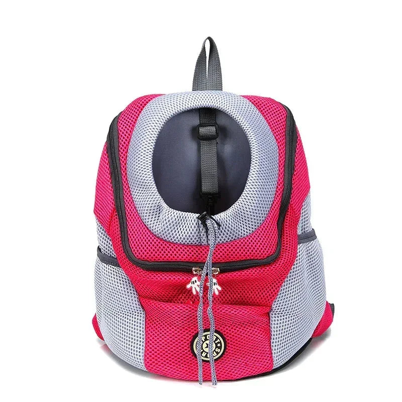 Pink pet front-fold backpack carrier with gray ventilation mesh and circular front window, straps