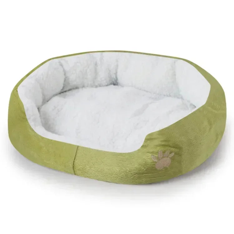 Plush oval dog bed sofa lounger, olive-green with inner white cushion and paw logo