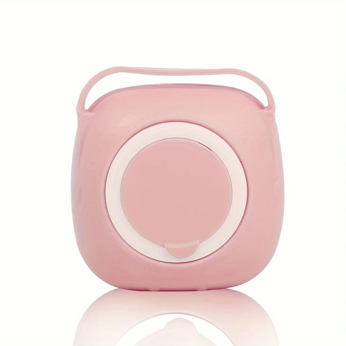 Pink silicone bath massage brush with circular bristle pad and handle loop