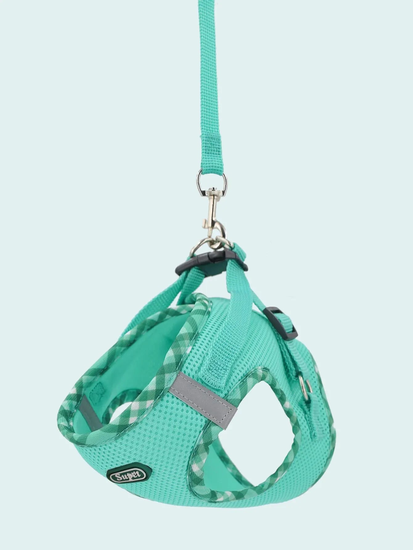 Teal plaid adjustable dog harness with leash attachment and metal clasp