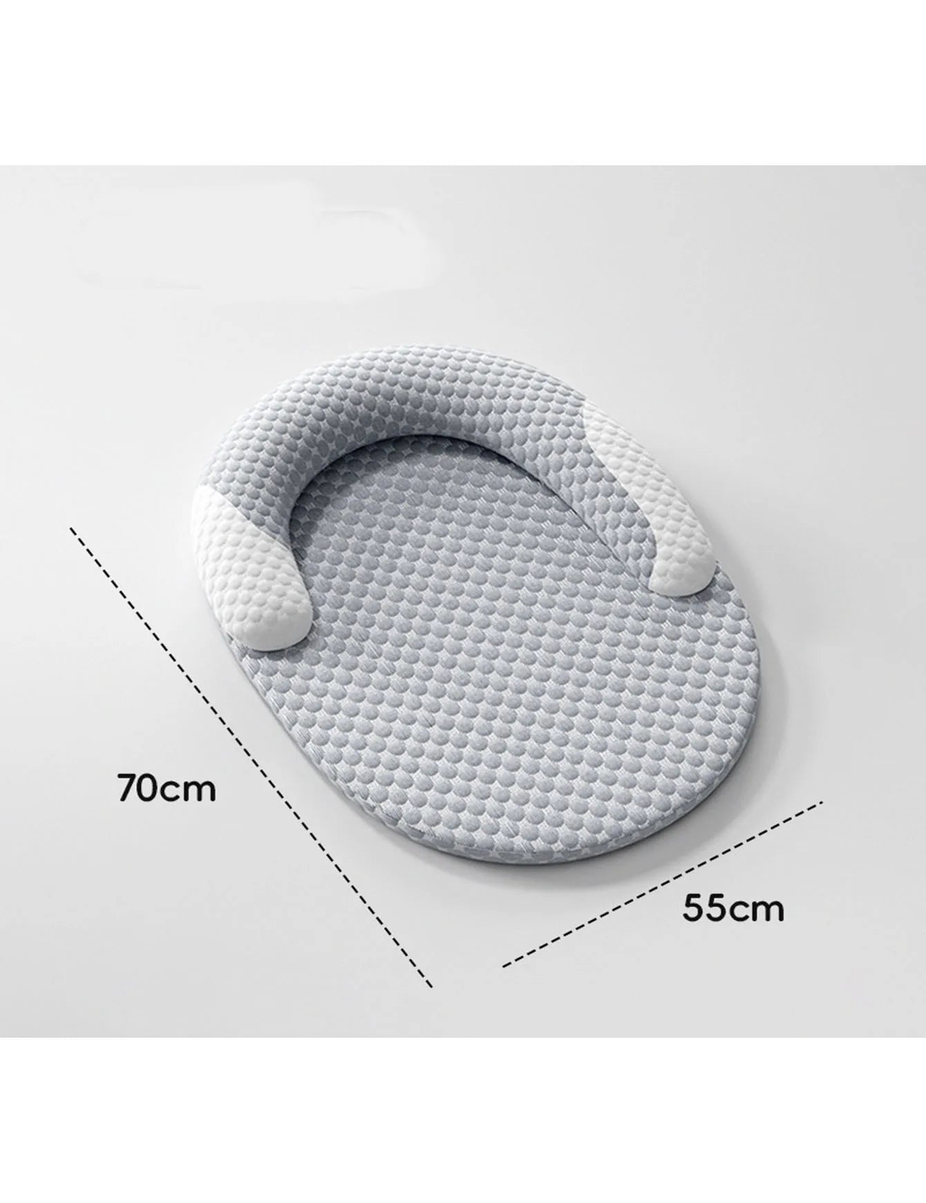 Donut-style dog bed with rounded cradle shape, light gray dotted cover; 70cm x 55cm