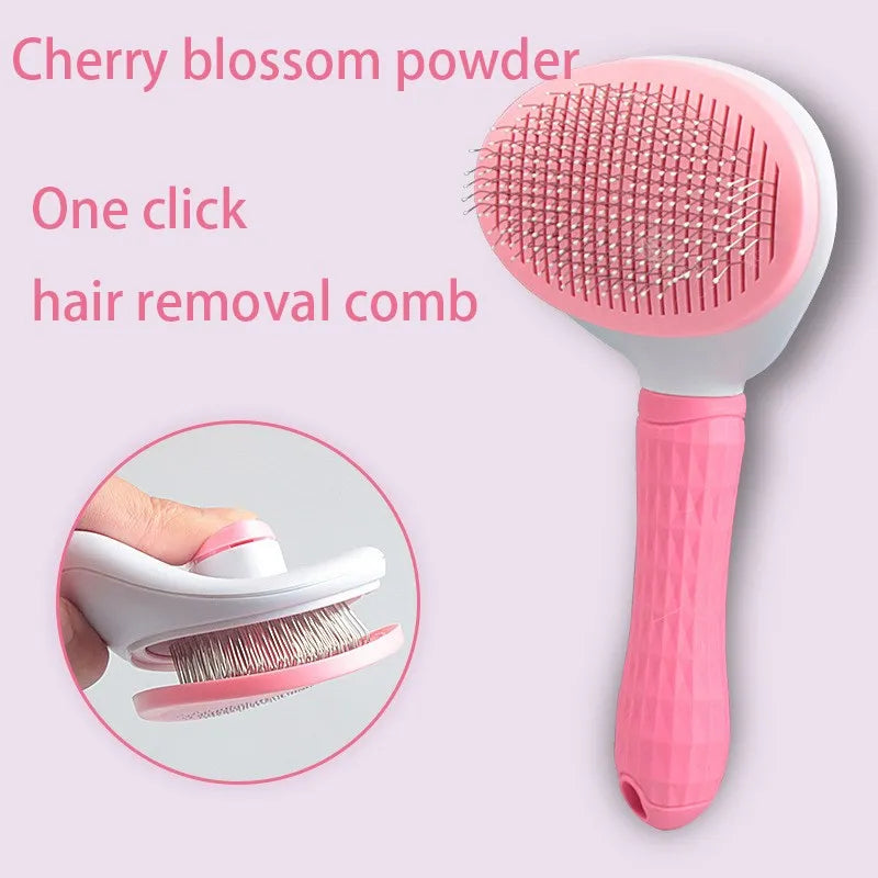 Pink pet hair remover grooming brush with rubber needle pad and textured handle