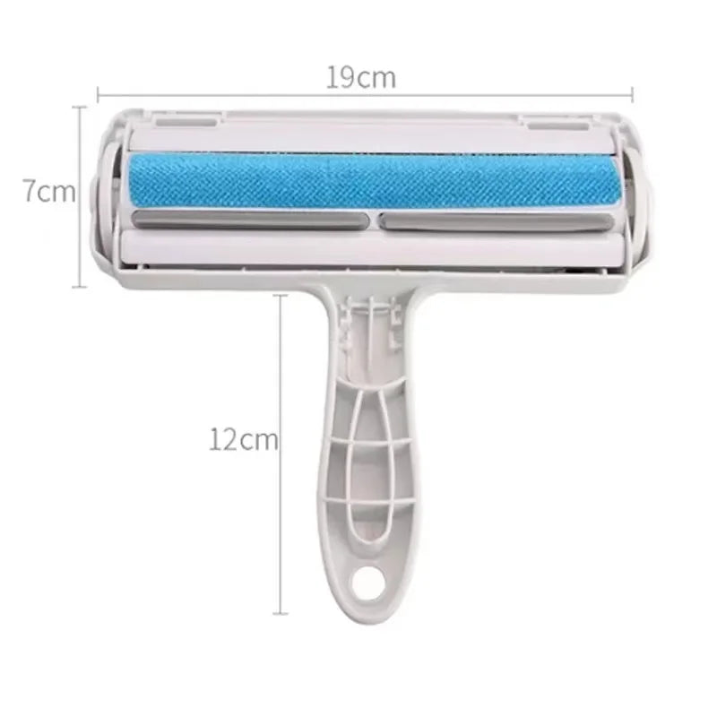 Pet hair remover brush with blue roller and stainless pins, white handle with measurements